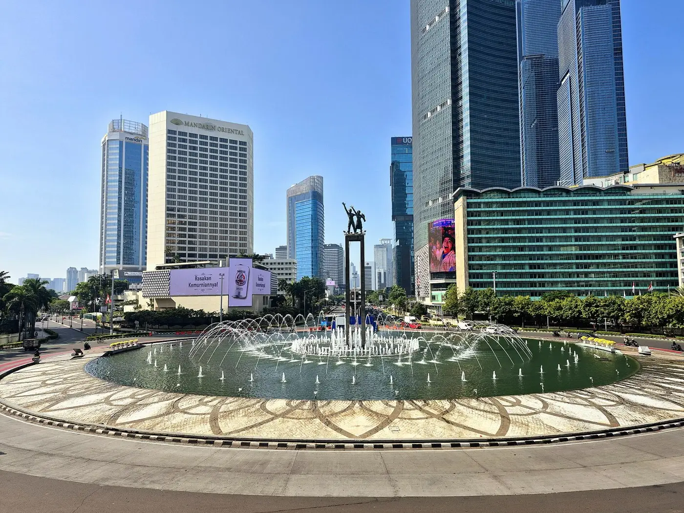 Bundaran HI roundabout with the Welcome Monument and fountain, central Jakarta, 2025